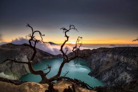 Ijen Crater during sunrise. The midnight hike is just worth it when you see the first ray of sun hits the horizon.