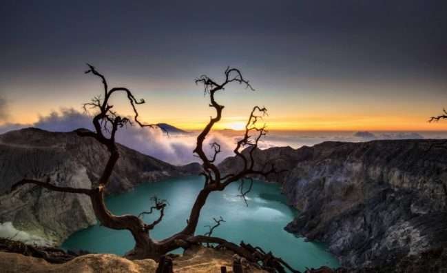 Ijen Crater during sunrise. The midnight hike is just worth it when you see the first ray of sun hits the horizon.